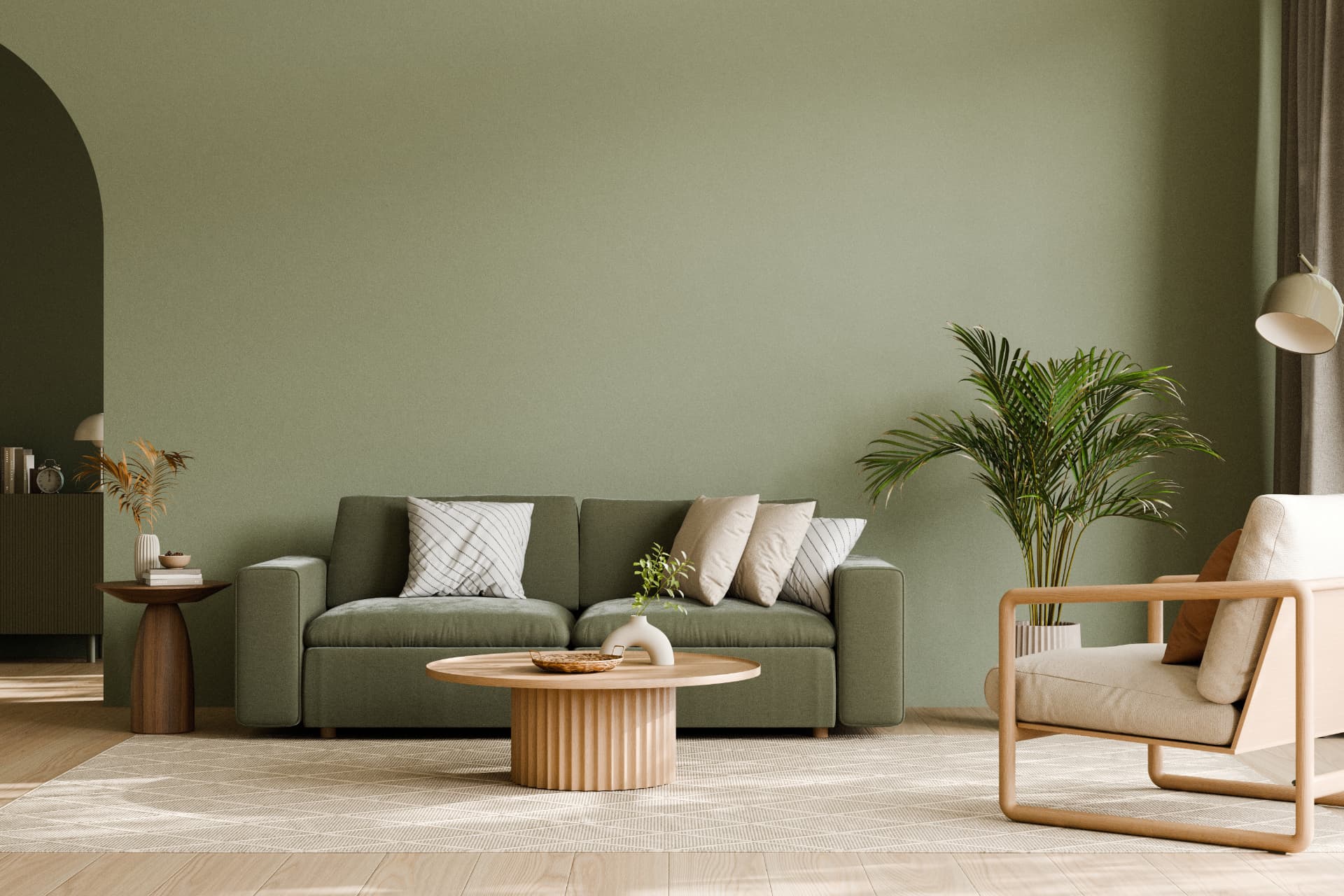 Living room with green seating, timber furniture and indoor greenery